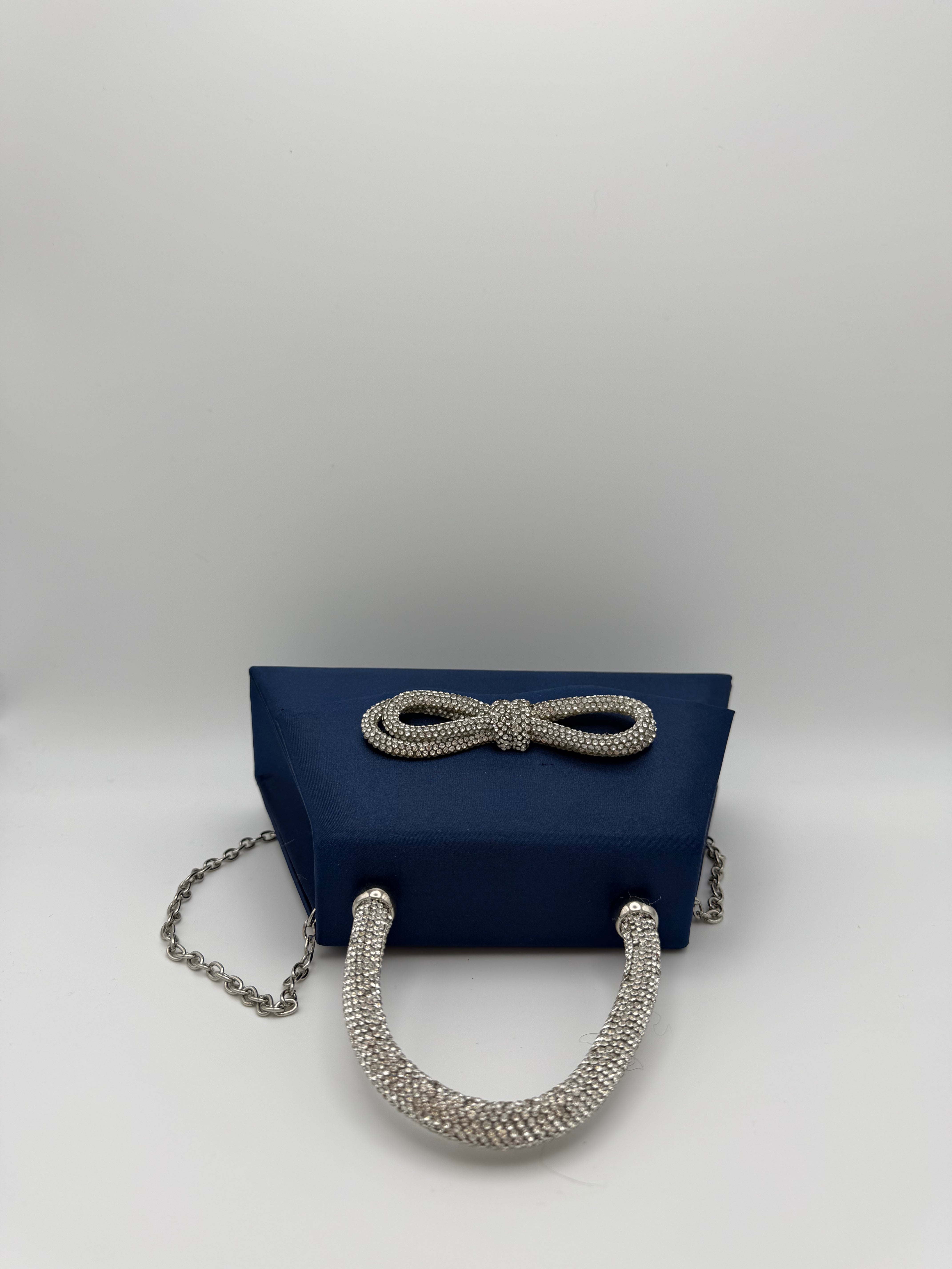 Tie Diamante Embedded Top Handle Clutch Bag